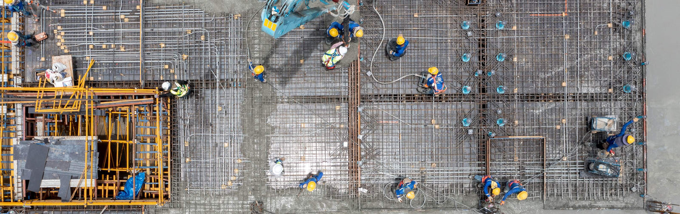Laying rebars and mesh in a building site